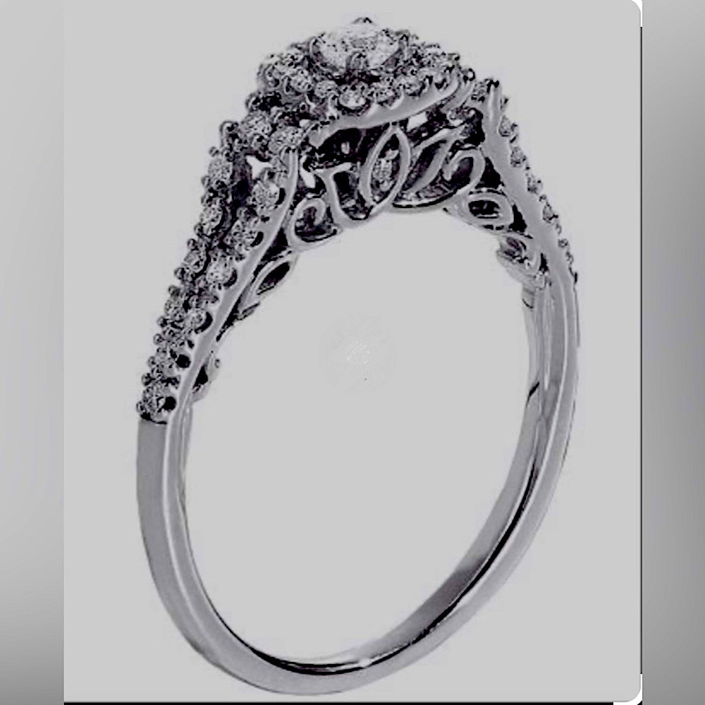 Vera Wang: Stunning HALO with lotus design - size 7 Diamond ring